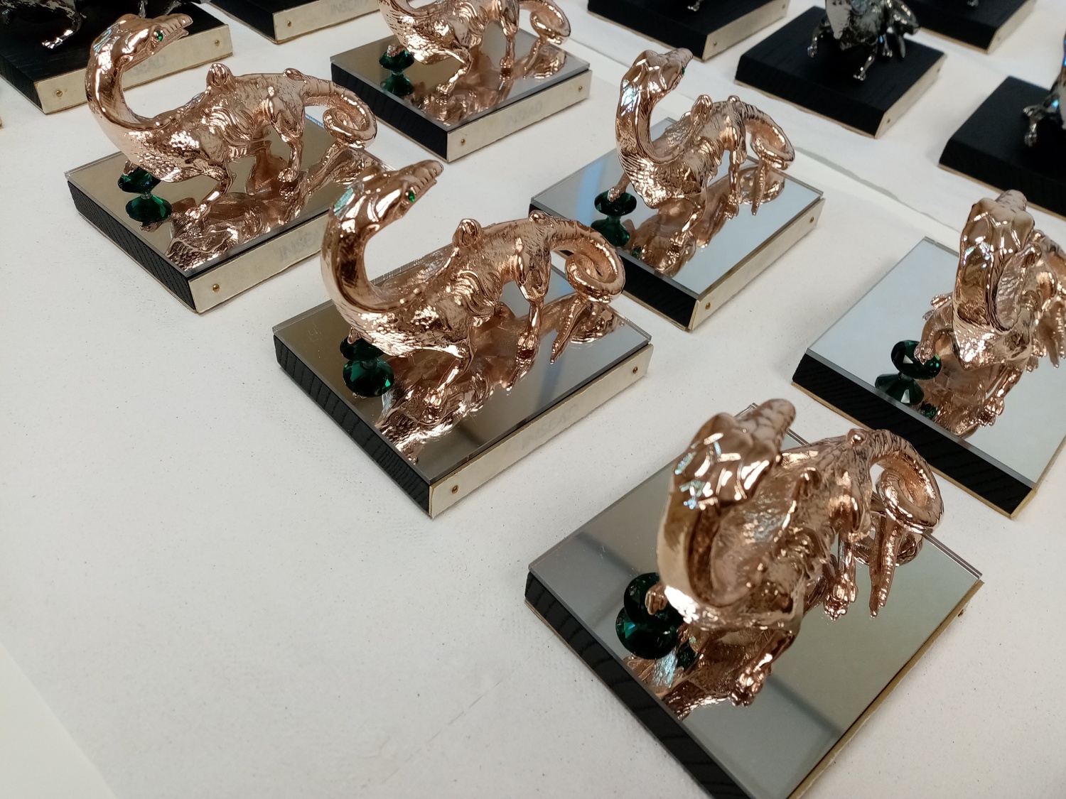 EAC Innovation & Metal Case Study - Salamander statuettes with green rhinestones